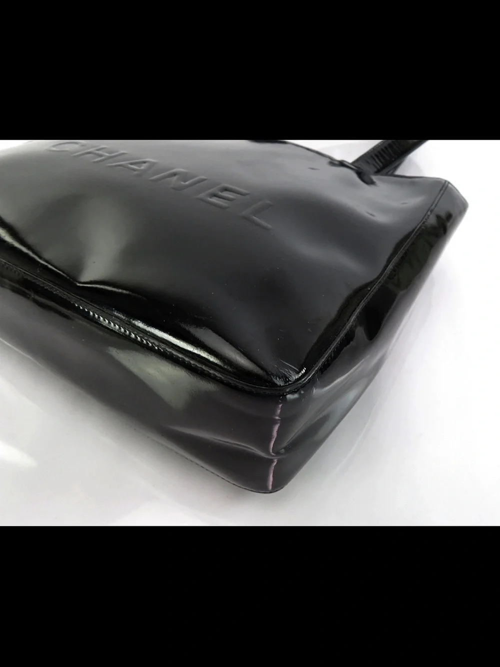 CHANEL Black Patent Tote with Embossed Logo